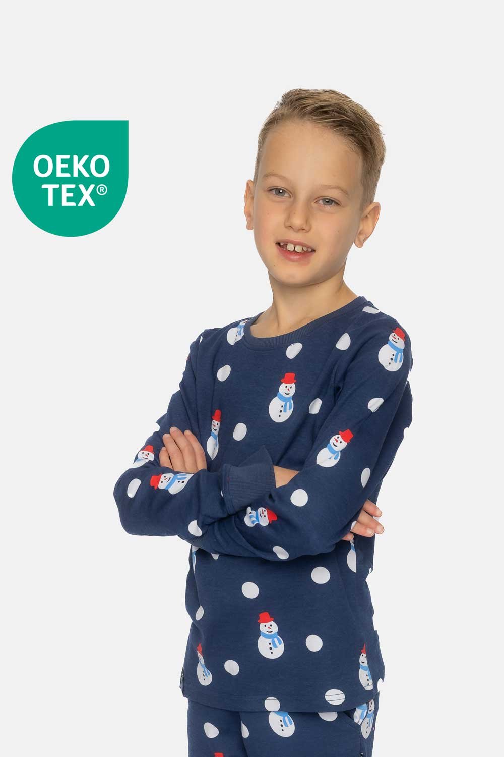 Winter kinderpyjama met sneeuwpoppen en speelde dots